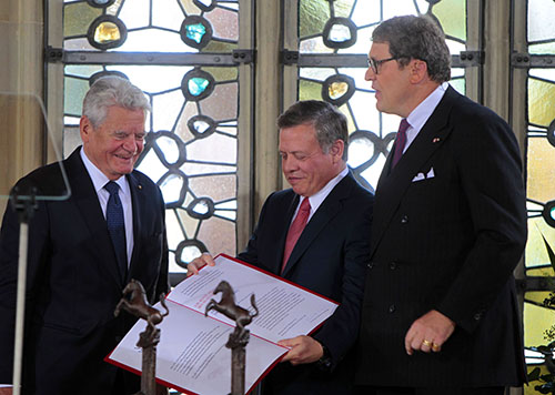 His Majesty King Abdullah receives the Peace of Westphalia Prize in recognition of his endeavours for peace and international security and stability in Münster City, Germany, on Saturday (Photo courtesy of Royal Court) 